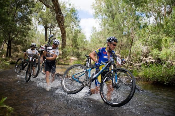 M3 winner Peter Selkrig in river crossing with Belgian brother M1 duo Kristof and Johan Schrauwen.
