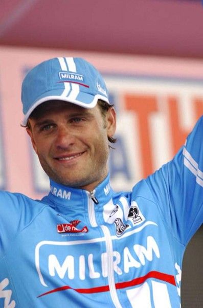 Tired, but happy Petacchi salutes from the podium