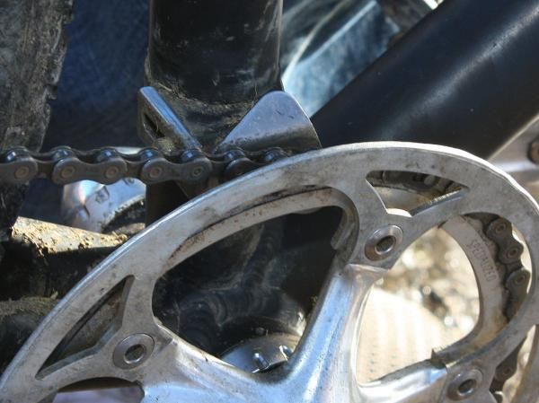 This was one of the more popular single-ring setups seen at the US cyclo-cross national championships, comprising an outer plate-style guide and an inner chain watcher - but with nothing to keep the chain from being ejected out the top in bumpy terrain or during a crash.