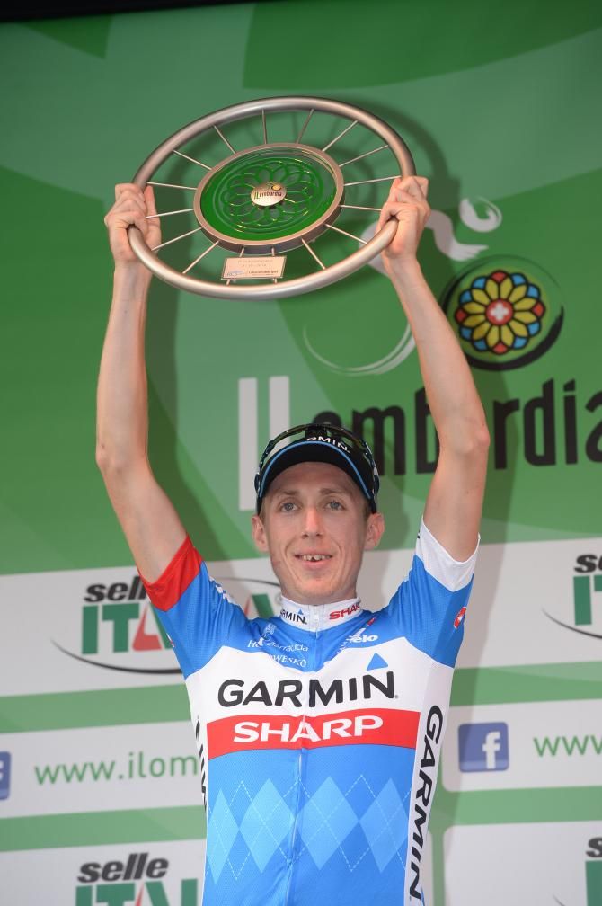 Dan Martin with his race winner's trophy