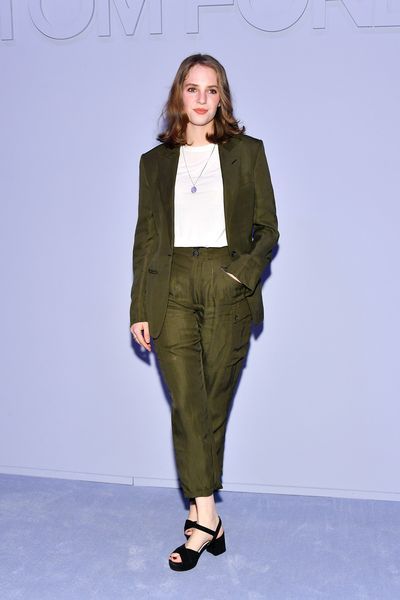Fashion model, Fashion show, Clothing, Fashion, Runway, Green, Khaki, Fashion design, Outerwear, Pantsuit,
