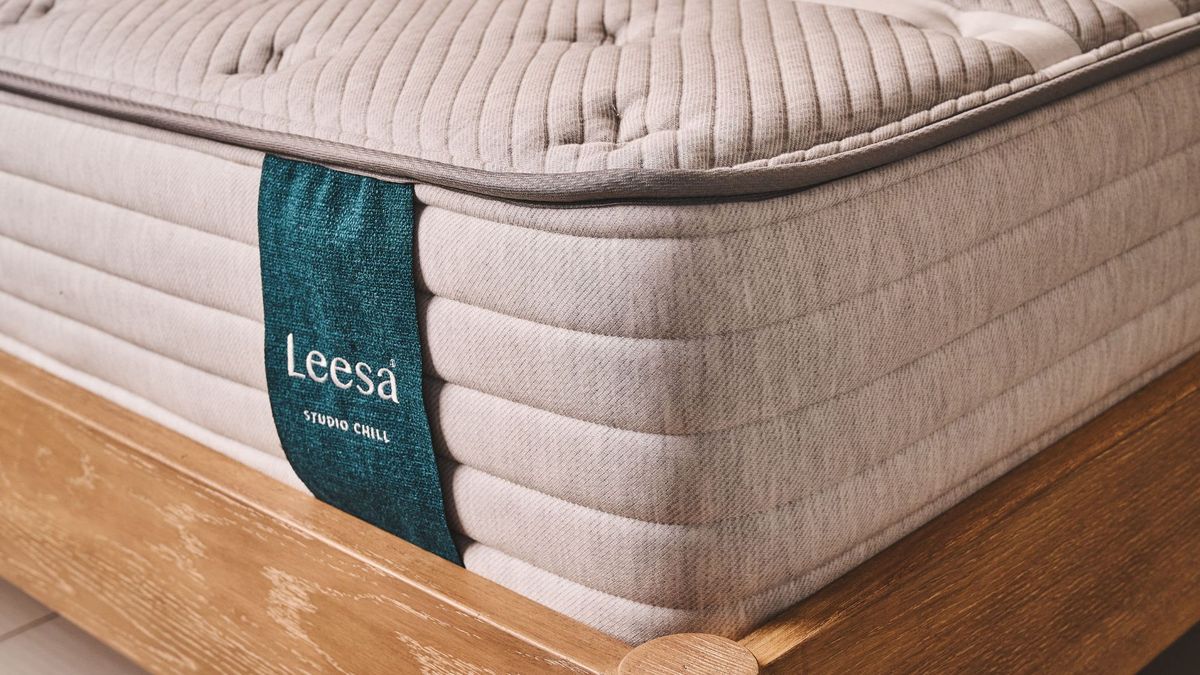 A close-up of the Leesa Studio Chill's piping and signature logo