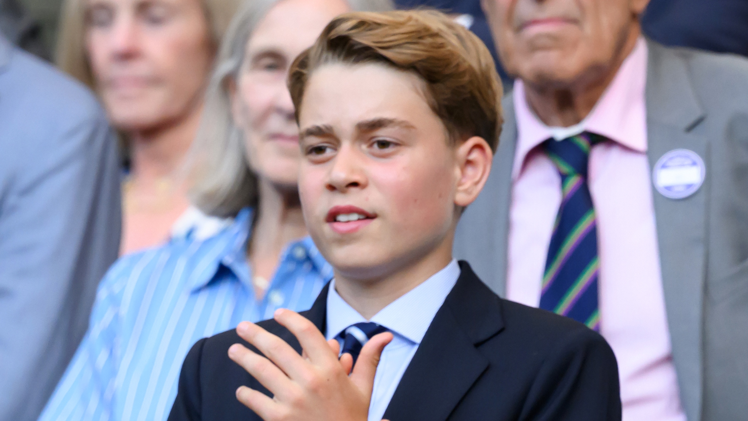Prince George of Wales claps as he attends day fourteen of the 2026 Wimbledon Tennis Championships on July 12, 2026