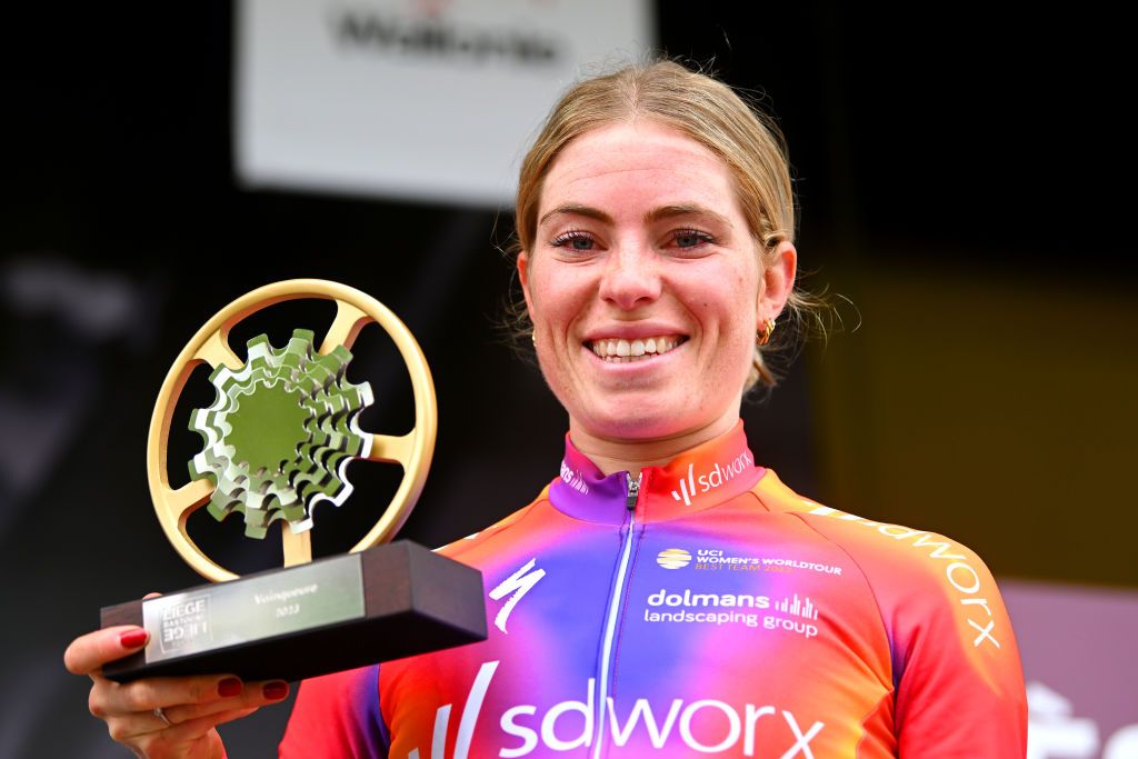 LIEGE BELGIUM APRIL 23 Demi Vollering of The Netherlands and Team SD Worx celebrates at podium as race winner with her trophy during the 7th Liege Bastogne Liege 2023 Womens Elite a 1428km one day race from Bastogne to Lige UCIWWT on April 23 2023 in Lige Belgium Photo by Luc ClaessenGetty Images