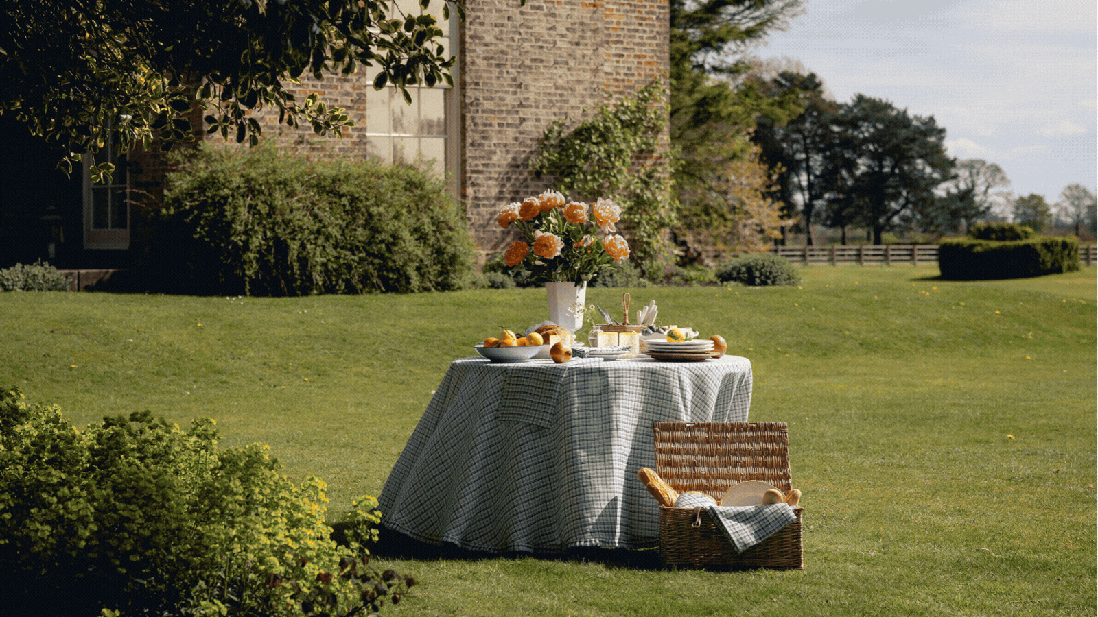 Rotating GIF of four images that show different new homeware collections. There is a large yard with a table set on it, a neutral living room, a bright, colorful living room, and an outdoor area.