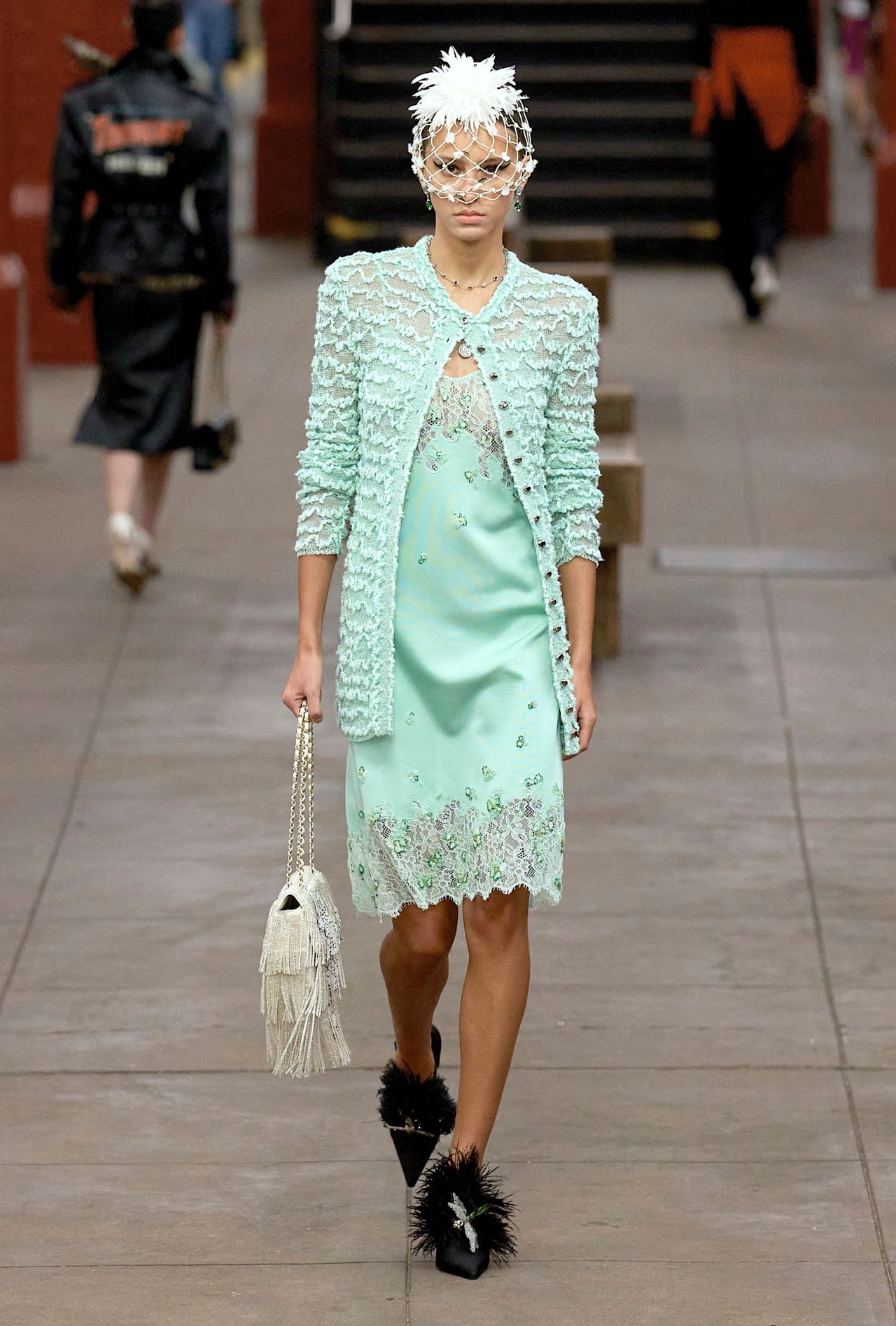 models walk the subway runway for the chanel metiers d'art 2026 show in new york city