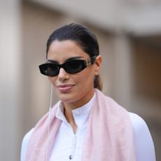 A woman attending A/W Paris Fashion week 2025/2026