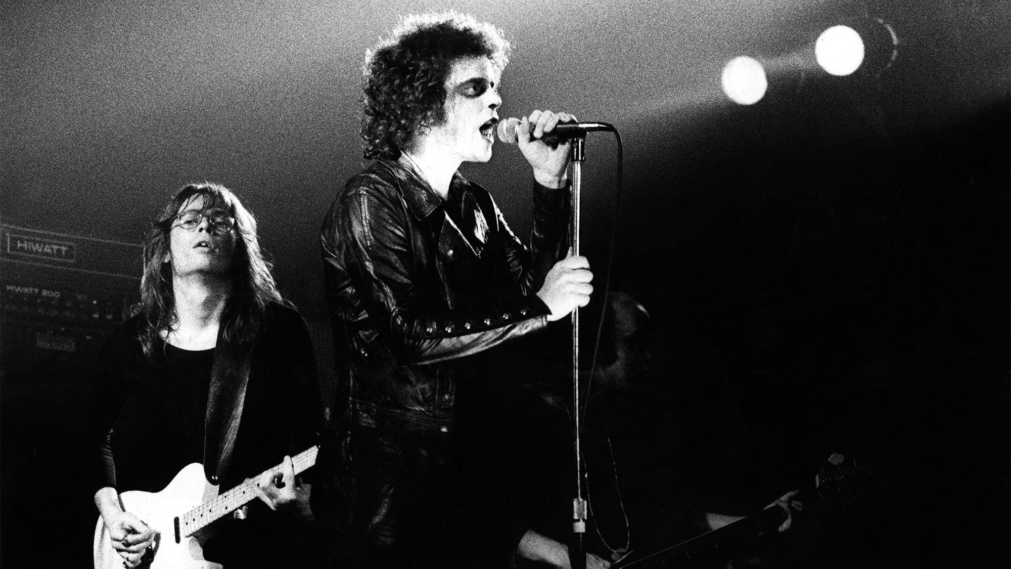 Lou Reed, with Steve Hunter (left), performs live on stage at the Carre Theatre in Amsterdam, Netherlands on September 20 1973