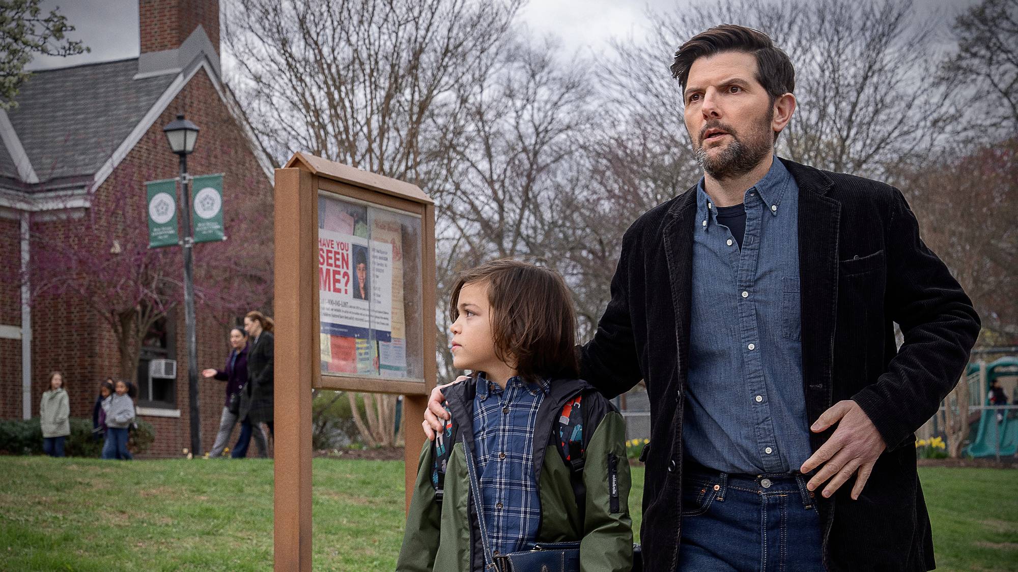 Acston Luca Porto as Jake Kennedy and Adam Scott as Tom Kennedy in "The Whisper Man" on Netflix