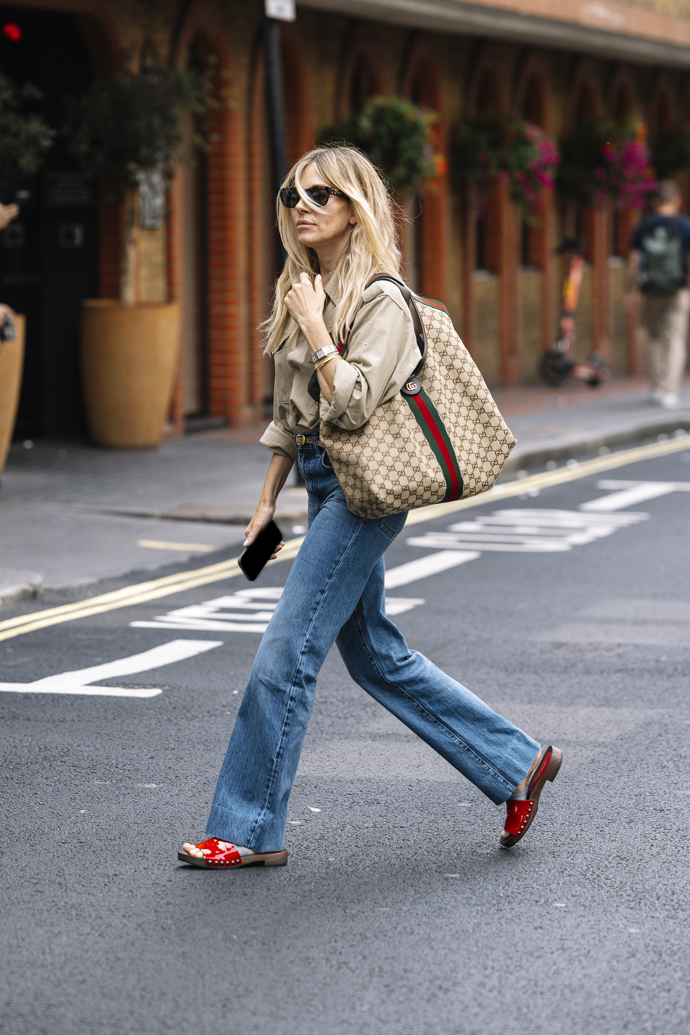 Sienna Miller was spotted in red Miu Miu clogs