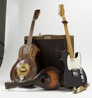 Rory Gallagher's National Resophonic guitar, mandolin and Fender Telecaster with his Fender amp