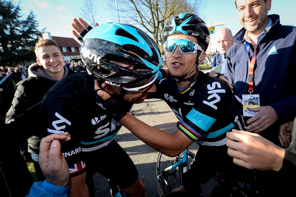 Michal Kwiatkowski is congratulated by his Sky teammate after the E3 Harelbeke win