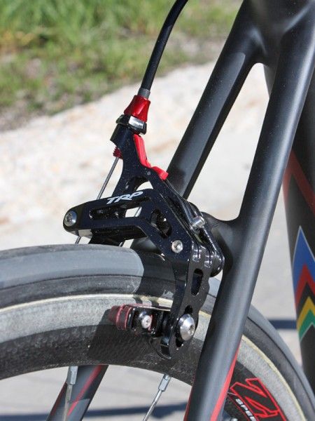 Current demo bikes were set up with TRP R960 machined aluminum dual-pivot calipers but production Tarmac SL3 Superlight bikes will come with TRP's new forged magnesium 970SL brakes.