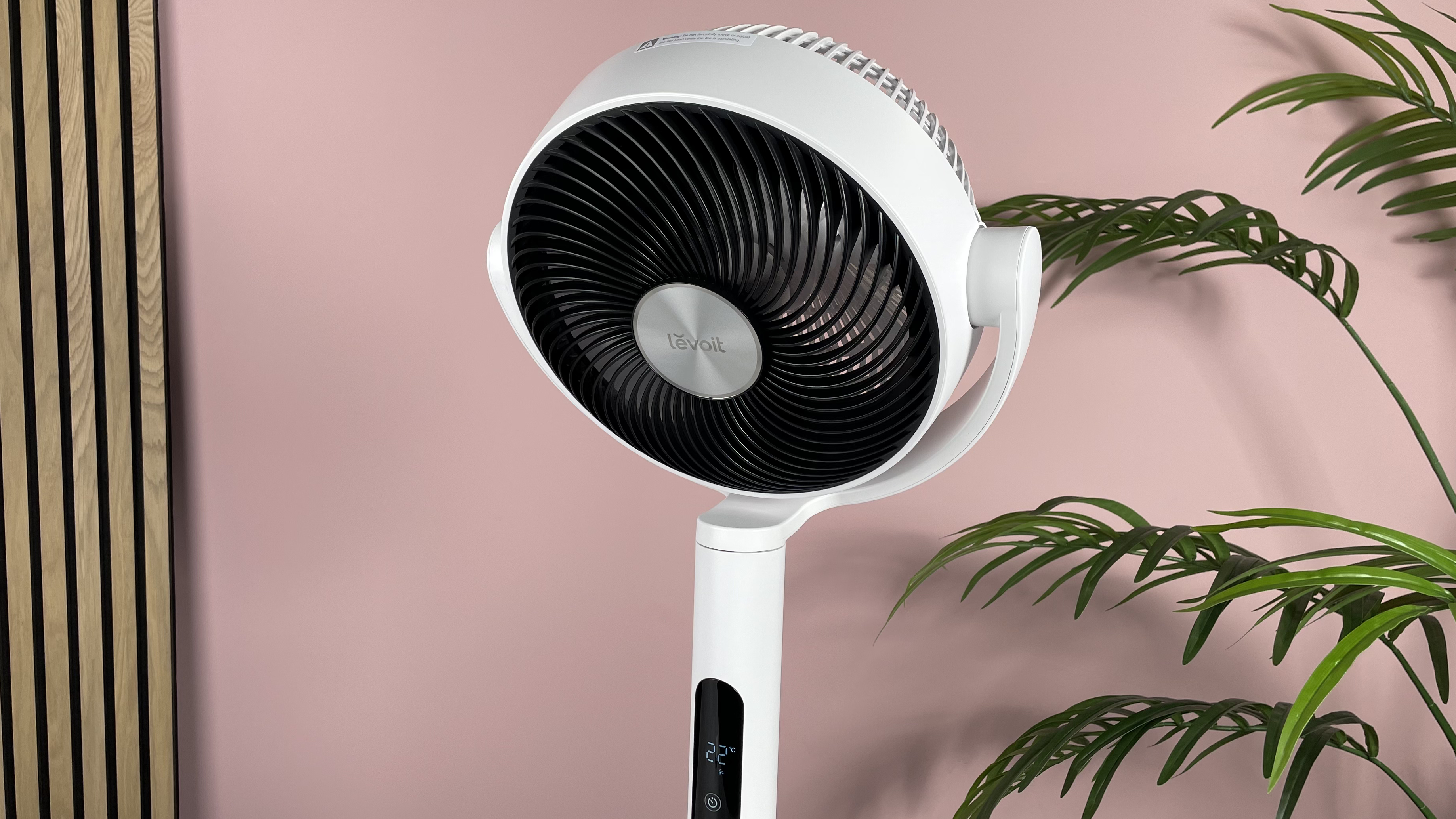 The fan is angled down toward the floor.