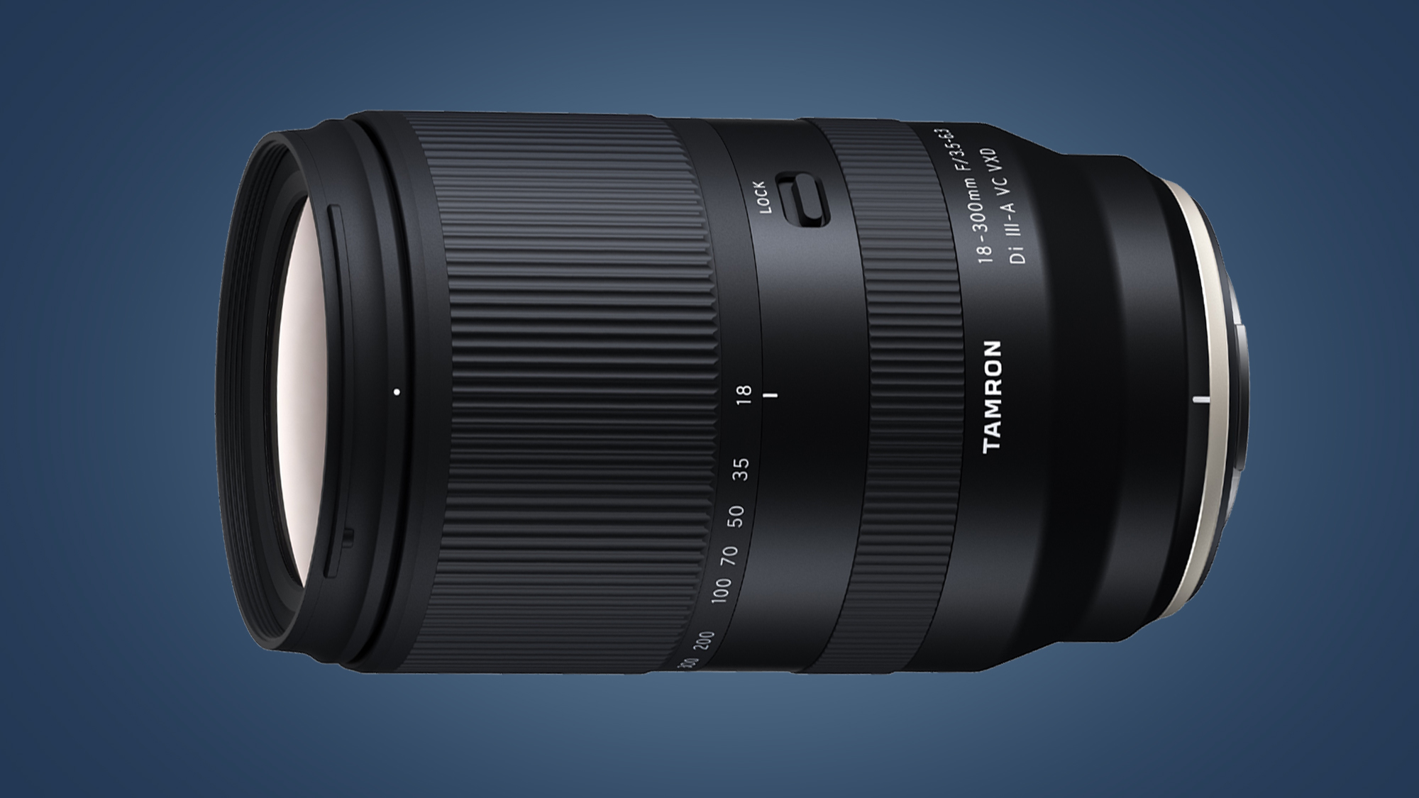 The Tamron 18-300mm F/3.5-6.3 Di III-A VC VXD lens on a blue background