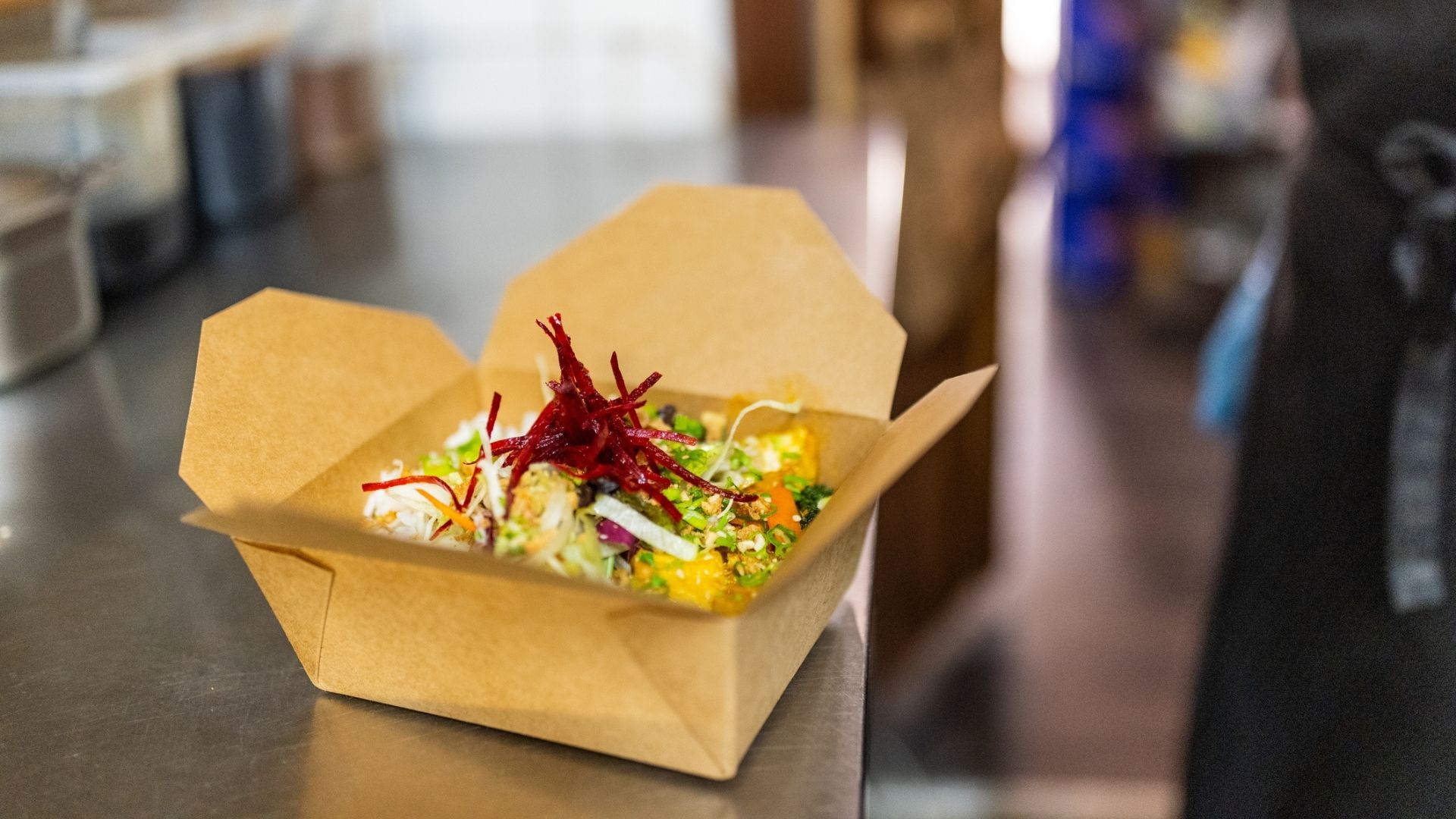 A cardboard box of takeaway food