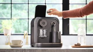 Keurig Alta system swaps plastic pods for compressed coffee tabs