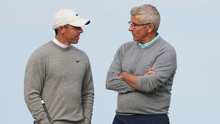 Rory McIlroy and Jay Monahan in discussion during the Alfred Dunhill Links Championship