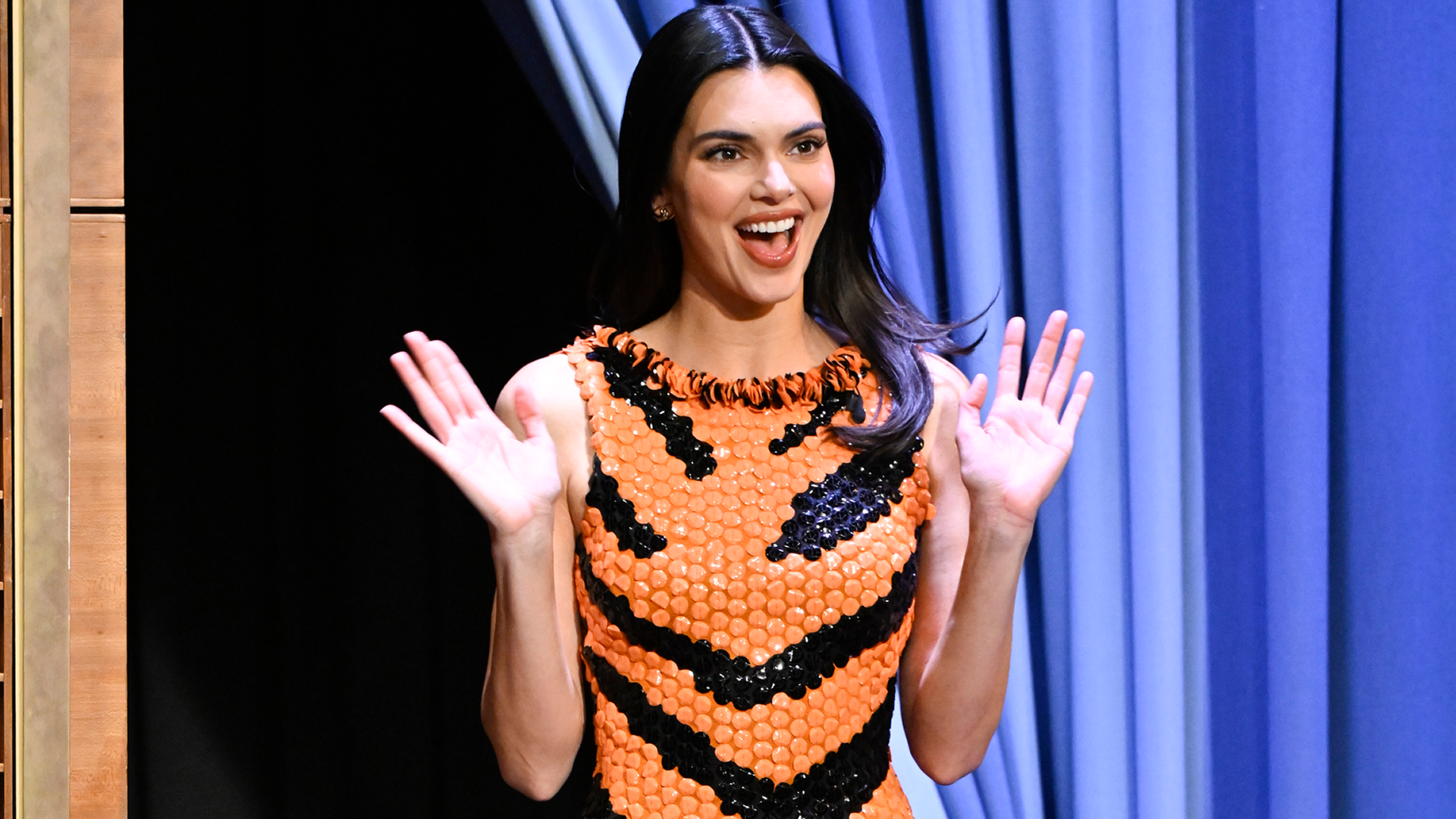 Kendall Jenner stopped by The Tonight Show Starring Jimmy Fallon in a tiger dress from Chanel's M&eacute;tiers d'Art Spring 2026 show