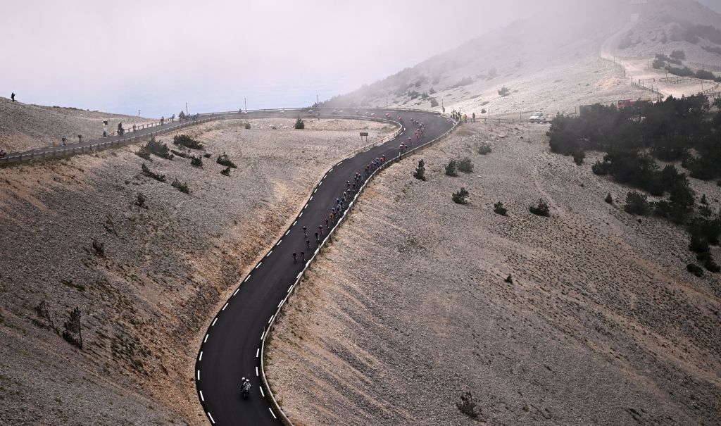 Tke pack descends the Mont Ventoux during the 11th stage of the 108th edition of the Tour de France cycling race 198 km between Sorgues and Malaucene on July 07 2021 Photo by AnneChristine POUJOULAT AFP Photo by ANNECHRISTINE POUJOULATAFP via Getty Images