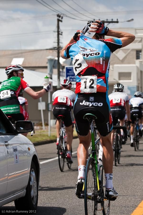 Nick Aitken loads up on refreshments for his Jayco-AIS teammates.