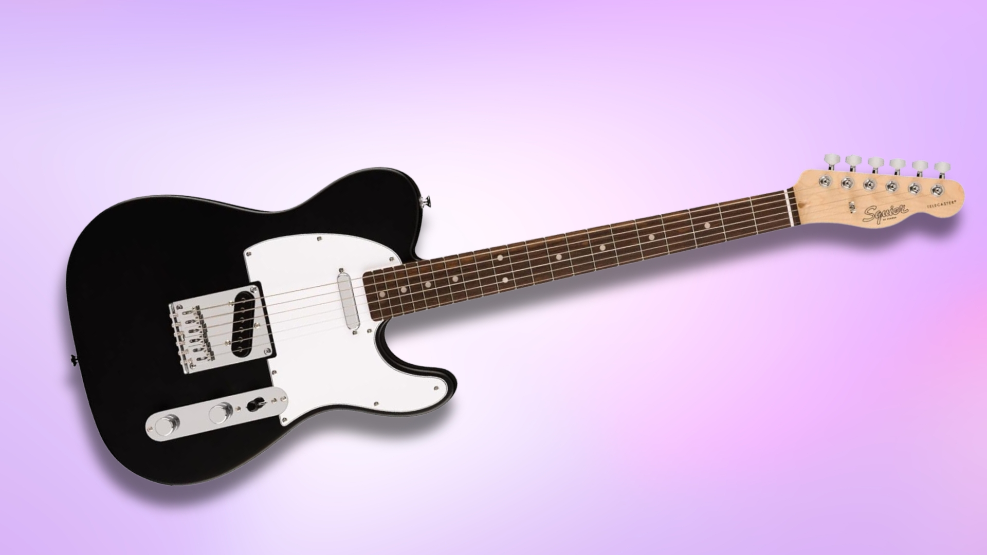 A Fender Debut Series Telecaster on a purple background