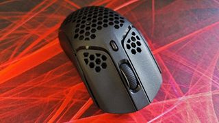 HyperX Pulsefire Haste Wireless review: gaming mouse from the front on matching mousemat