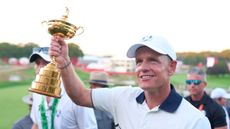 Luke Donald holds up the Ryder Cup at Bethpage Black in 2025 after leading Team Europe to success