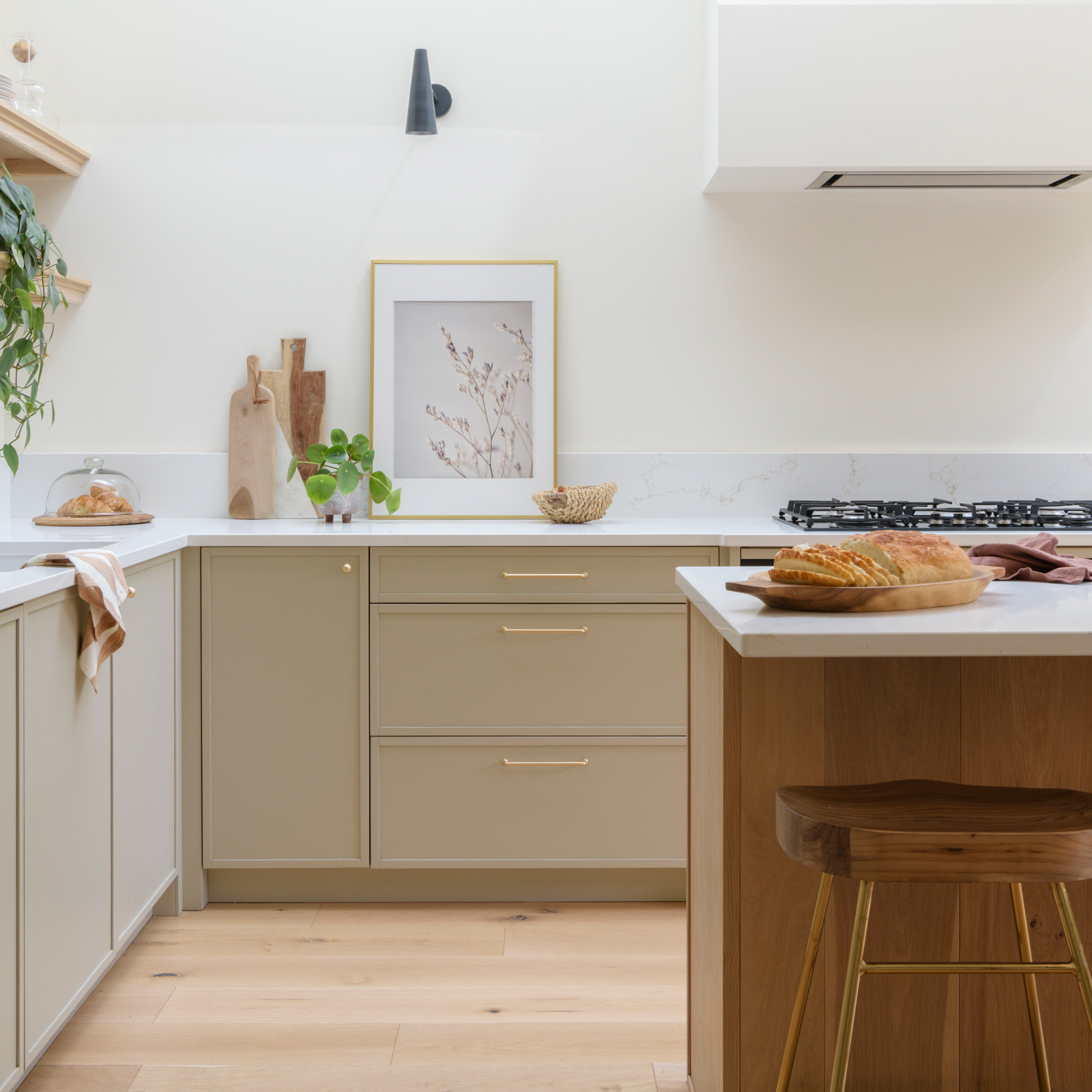 neutral kitchen with wooden flooring and white walls