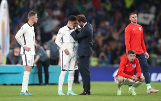 Southgate consoles his players at the end of the final