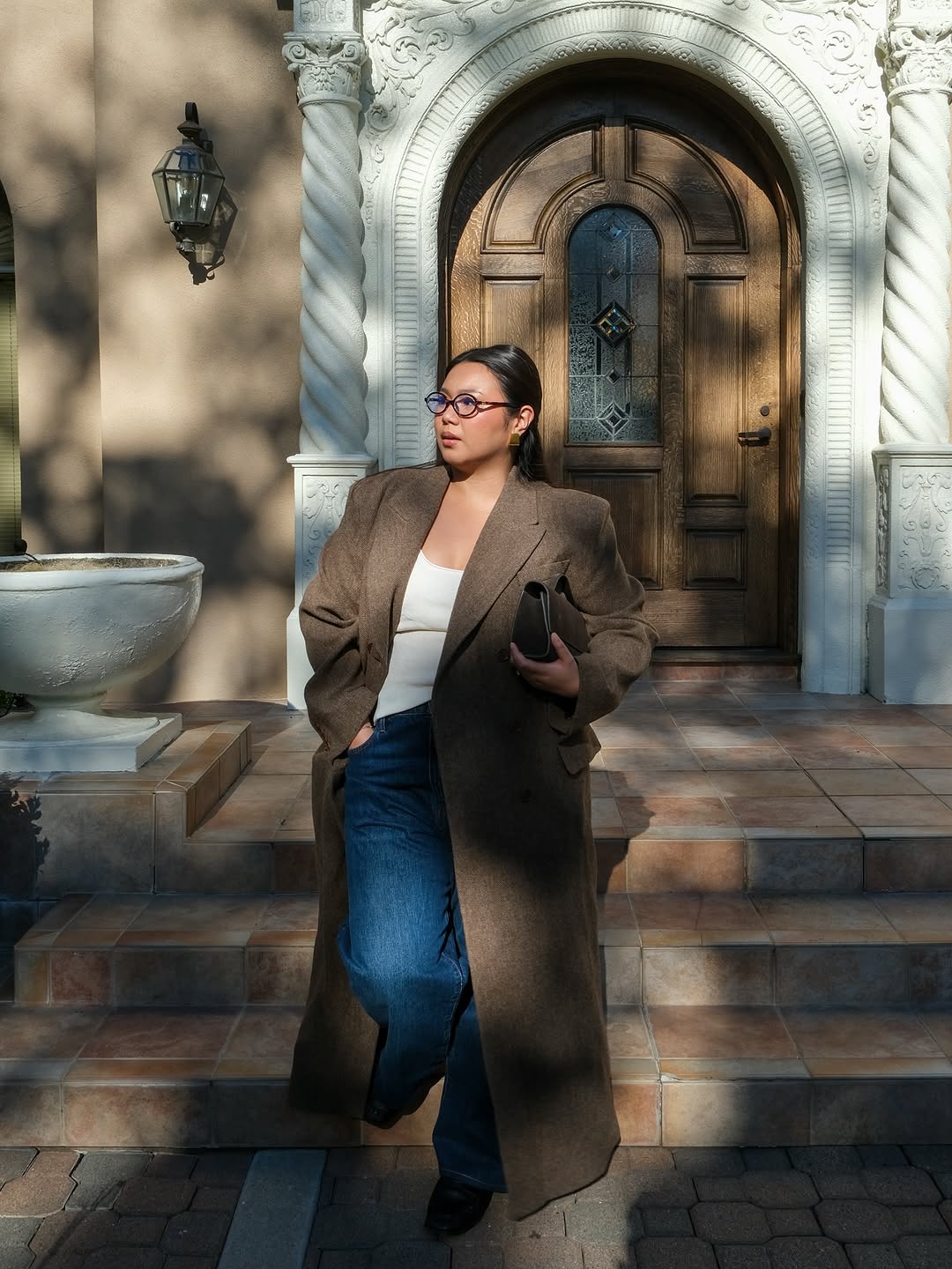 woman wearing winter denim outfit idea 2025