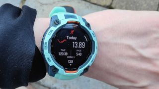 Garmin instinct 3 in neotropic green on wrist