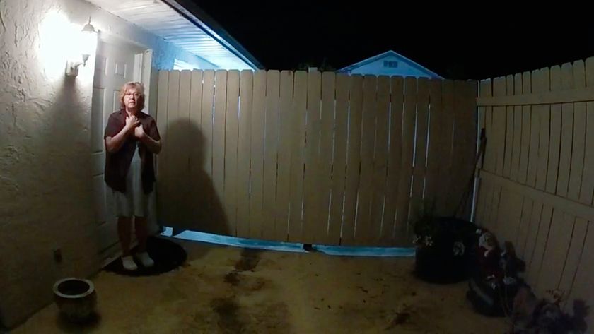 Susan Lorincz stands just outside the back door of her home, as seen on police body cam footage in the documentary &quot;The Perfect Neighbor&quot; on Netflix. 