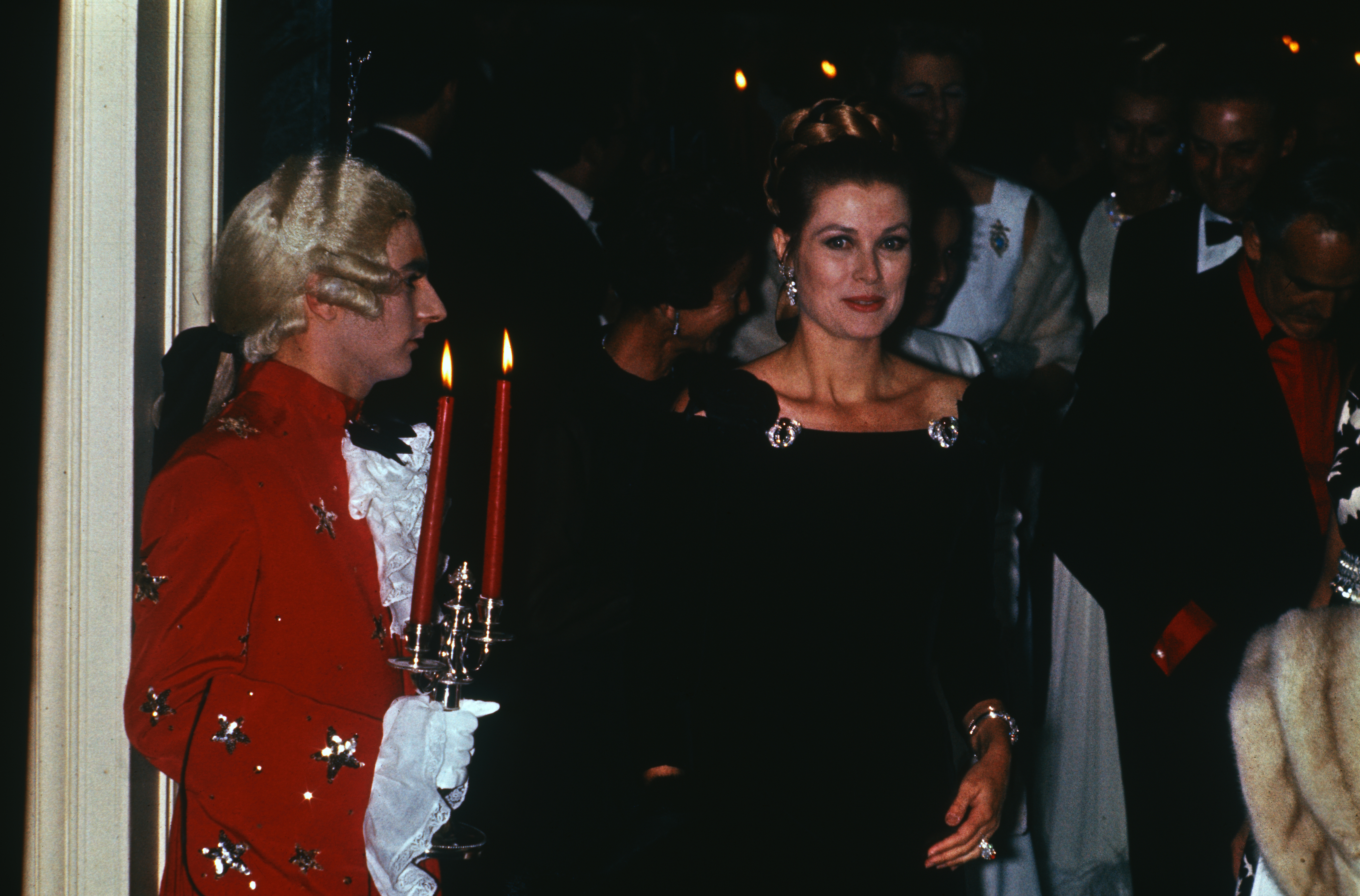 Grace Kelly in a long sleeve black dress