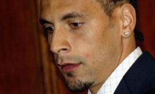 Rio Ferdinand leaves a press conference in 20045 after his appeal against an eight-month ban for missing a drugs test fails.