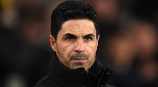 Mikel Arteta, Manager of Arsenal, looks on prior to the Emirates FA Cup Third Round match between Arsenal and Liverpool at Emirates Stadium on January 07, 2024 in London, England. Arsenal wear an all-white kit at home, for the first time in the club's history, in support of the 'No More Red' campaign against knife crime and youth violence. (Photo by Alex Burstow/Arsenal FC via Getty Images)