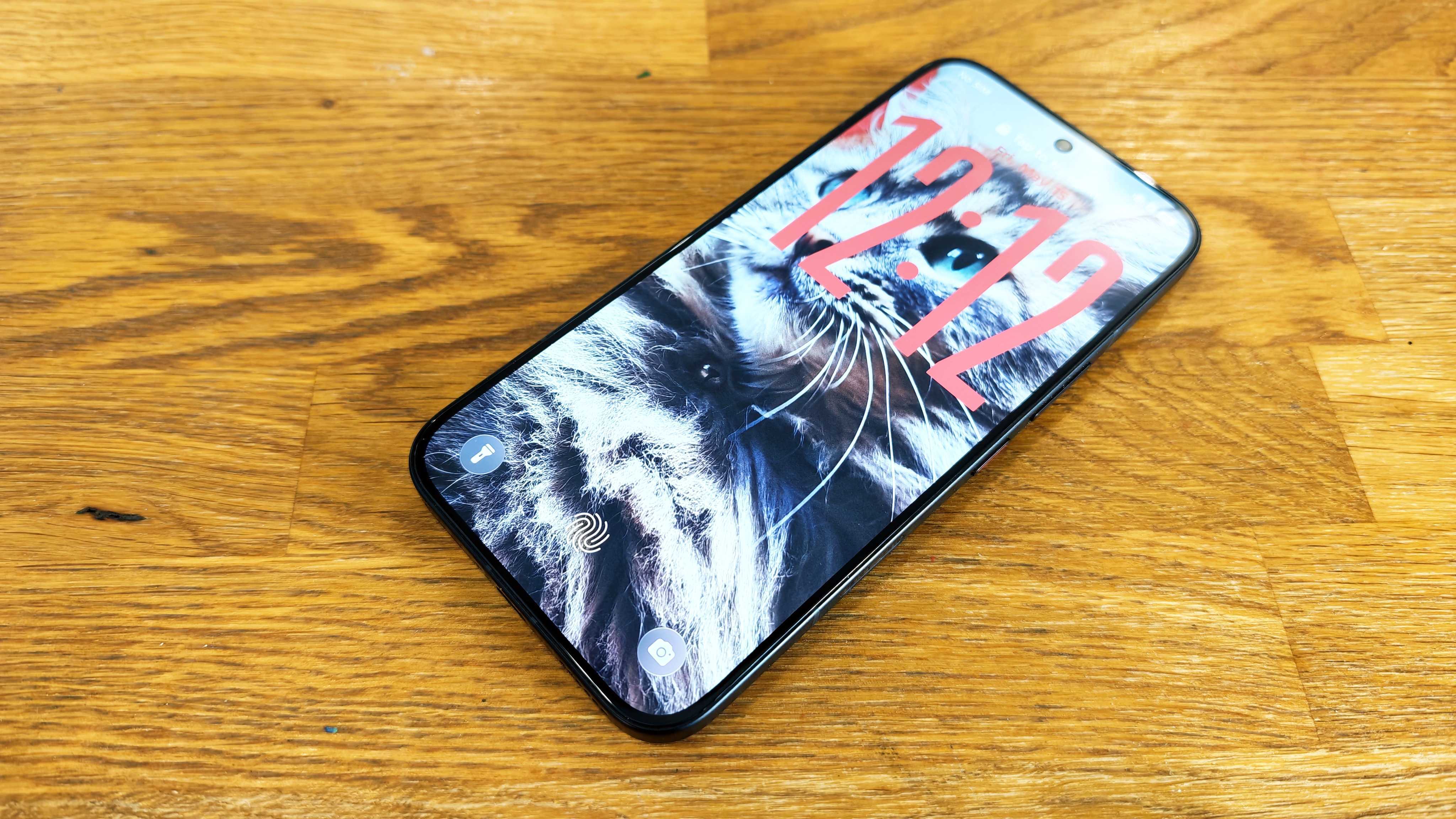 Image of the Infinix Note 60 Ultra sitting on a wooden table
