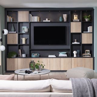 Living room shelving ideas with black TV storage