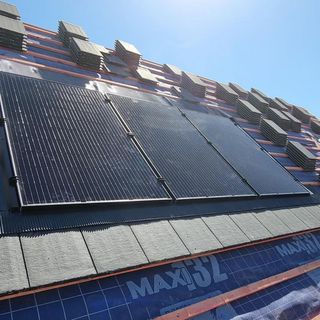 multistoried building with solar panels