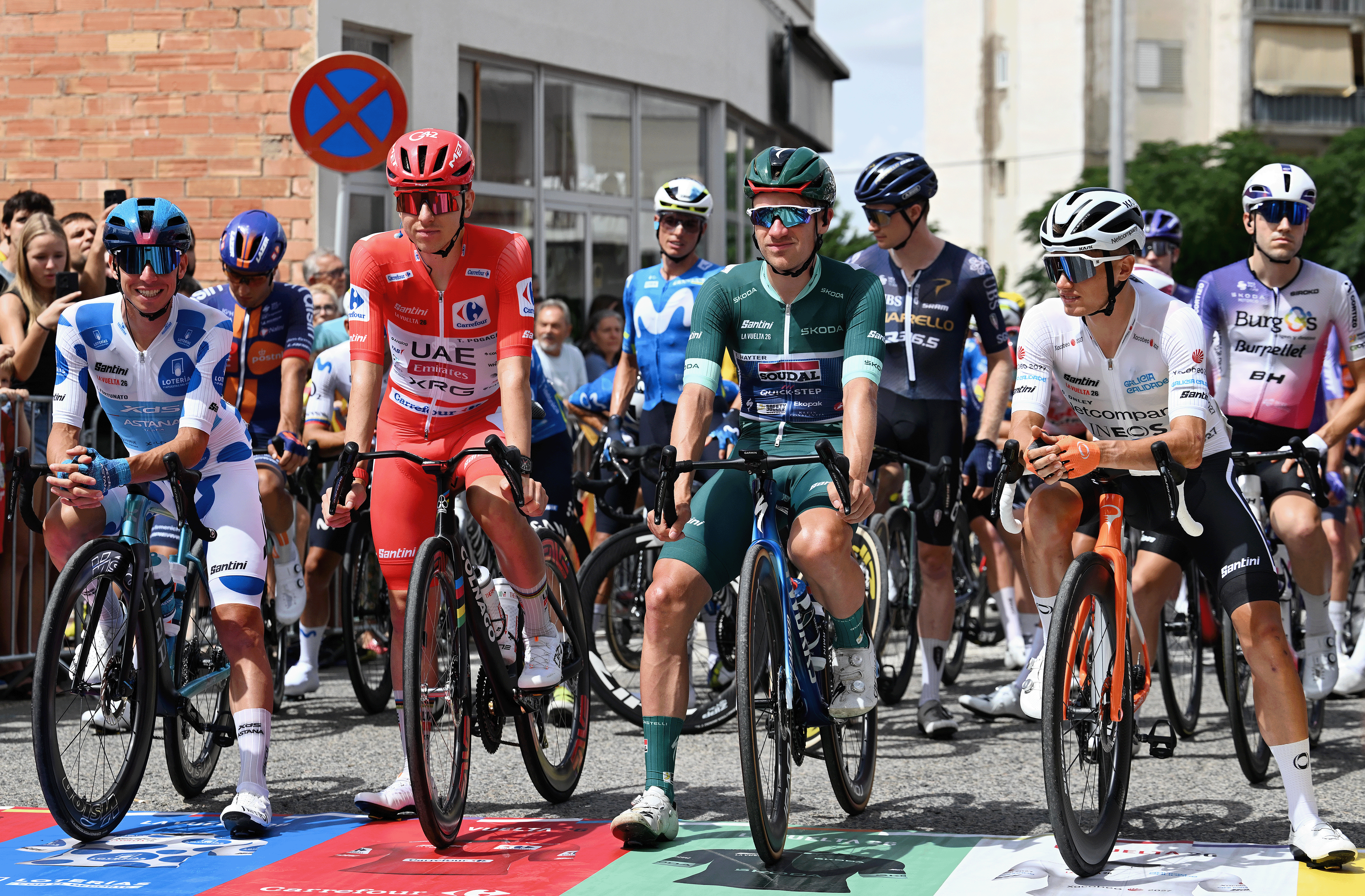 Lorenzo Fortunato, Tadej Pogacar, Ethan Hayter and Oscar Onley line up in the leaders jerseys of the Vuelta a Espa&amp;ntilde;a before the start of stage 5(Photo by Tim de Waele/Getty Images)