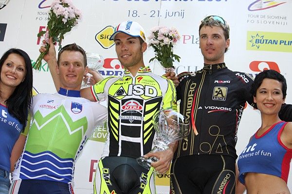 Giovanni Visconti (ISD) on the stage podium with Grega Bole and Jure Kocjan