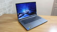 Lenovo 7 Slim Pro X_laptop open angled forwards (16 by 9).