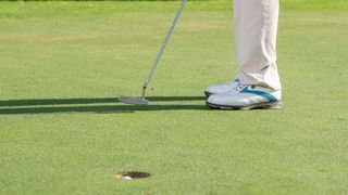 Keith Williams practices holing out putts from short range