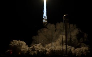 A brilliant exhaust plume shoots from a Northrop Grumman Antares rocket in this view taken just after its successful launch of the Cygnus NG-10 cargo ship from Pad-0A of NASA's Wallops Flight Facility on Wallops Island, Virginia on Nov. 17, 2018.