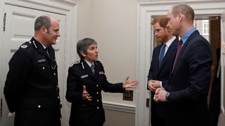 Prince William, Duke of Cambridge and Prince Harry talk with Metropolitan Police Commissioner Cressida Dick (C) and Police commander Stuart Cundy