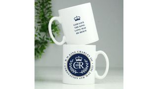 Two King Charles coronation personalized mugs.
