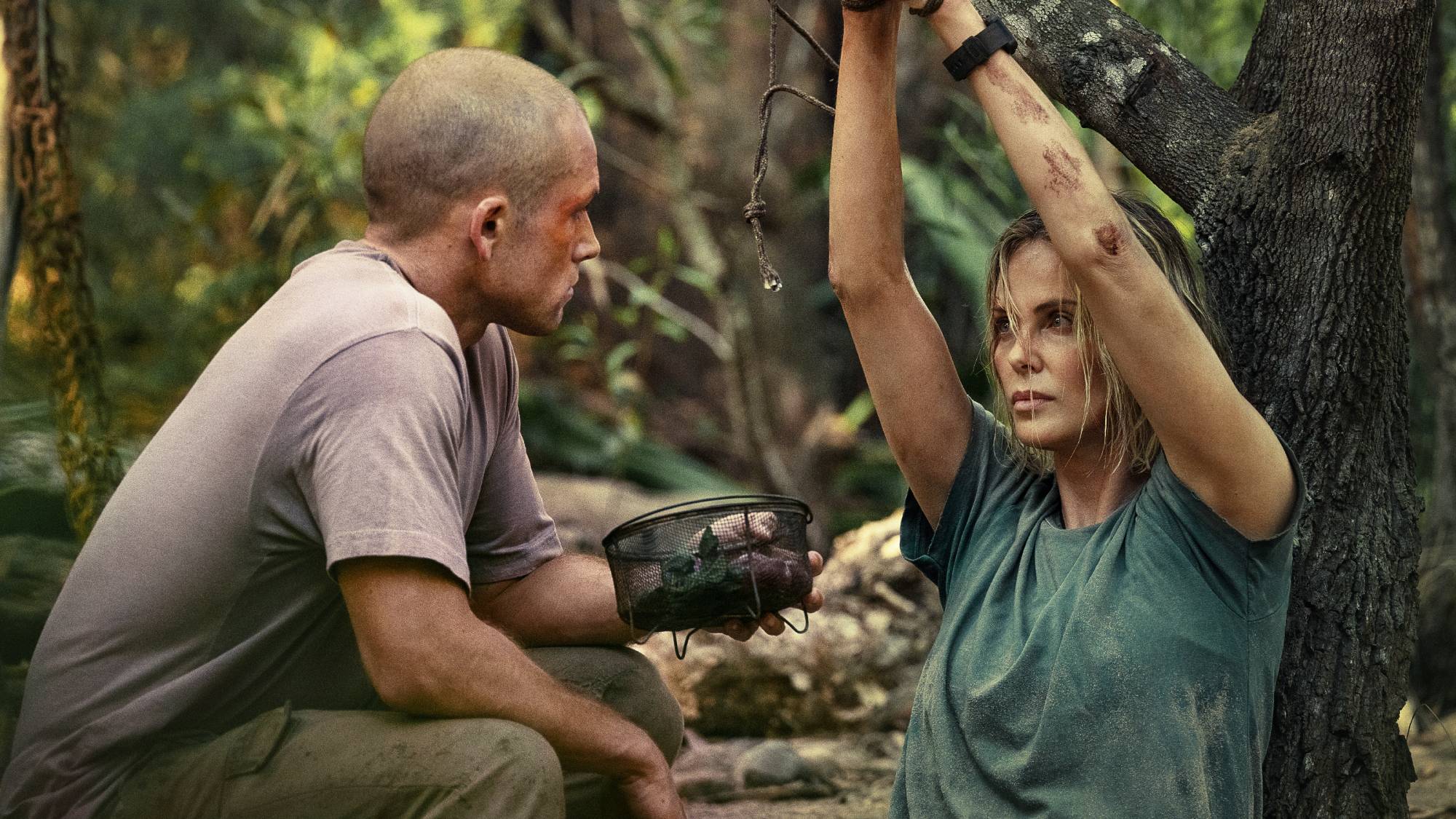 Taron Egerton as Ben and Charlize Theron as Sasha in "Apex" movie on Netflix (2026)