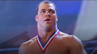 Kurt Angle walks out with his gold medal ready for a match on Monday Night Raw.