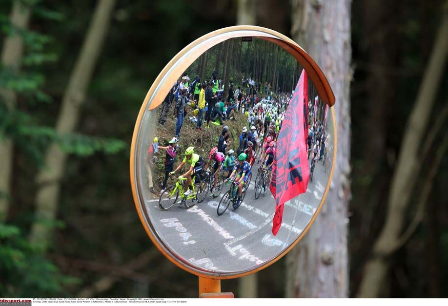 The peloton climbs