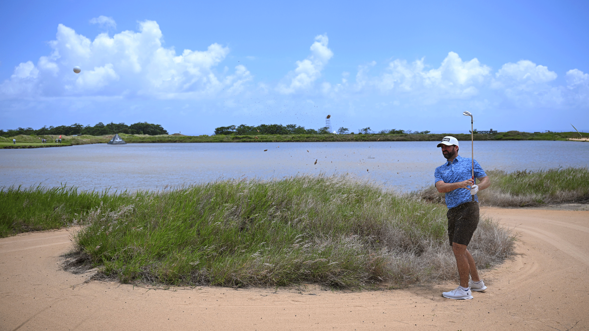John Parry hits a shot out of a bunker during the Pro-Am before the AfrAsia Bank Mauritius Open in 2025